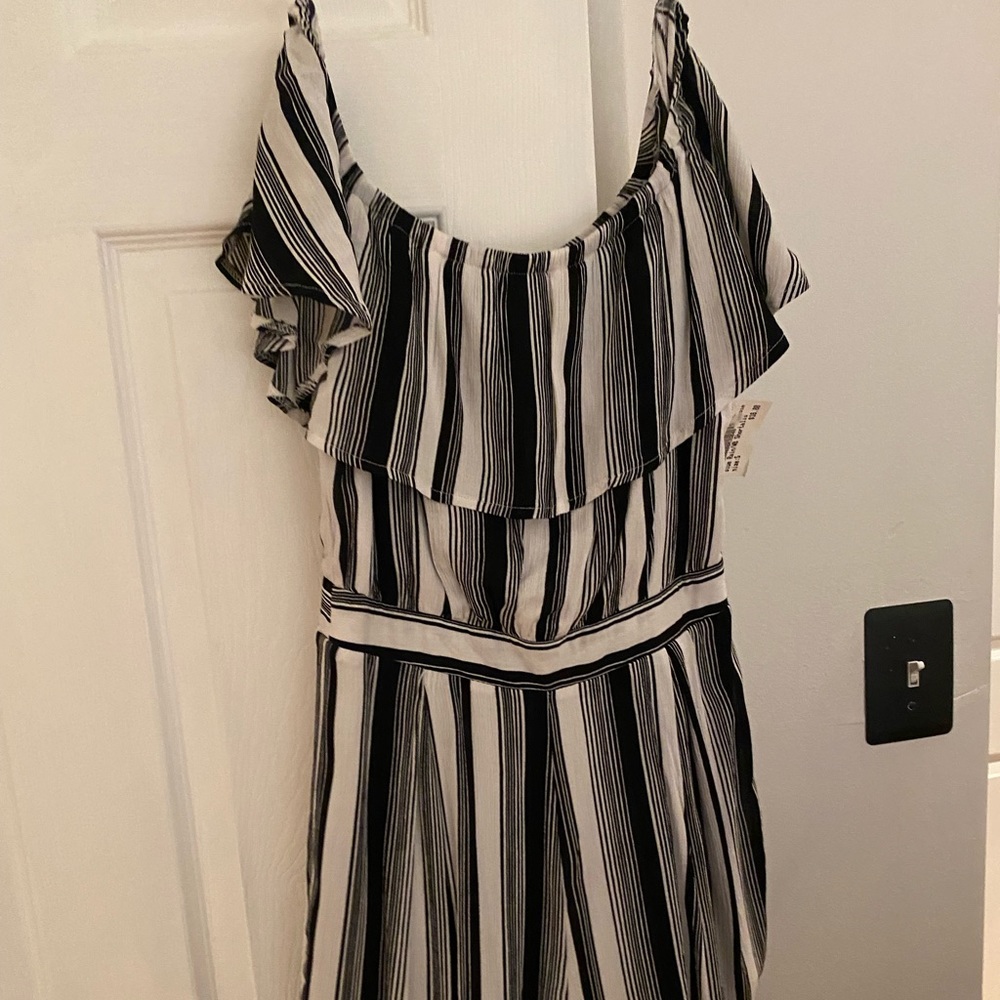 Black and white striped Francesca’s off the shoulder romper size small